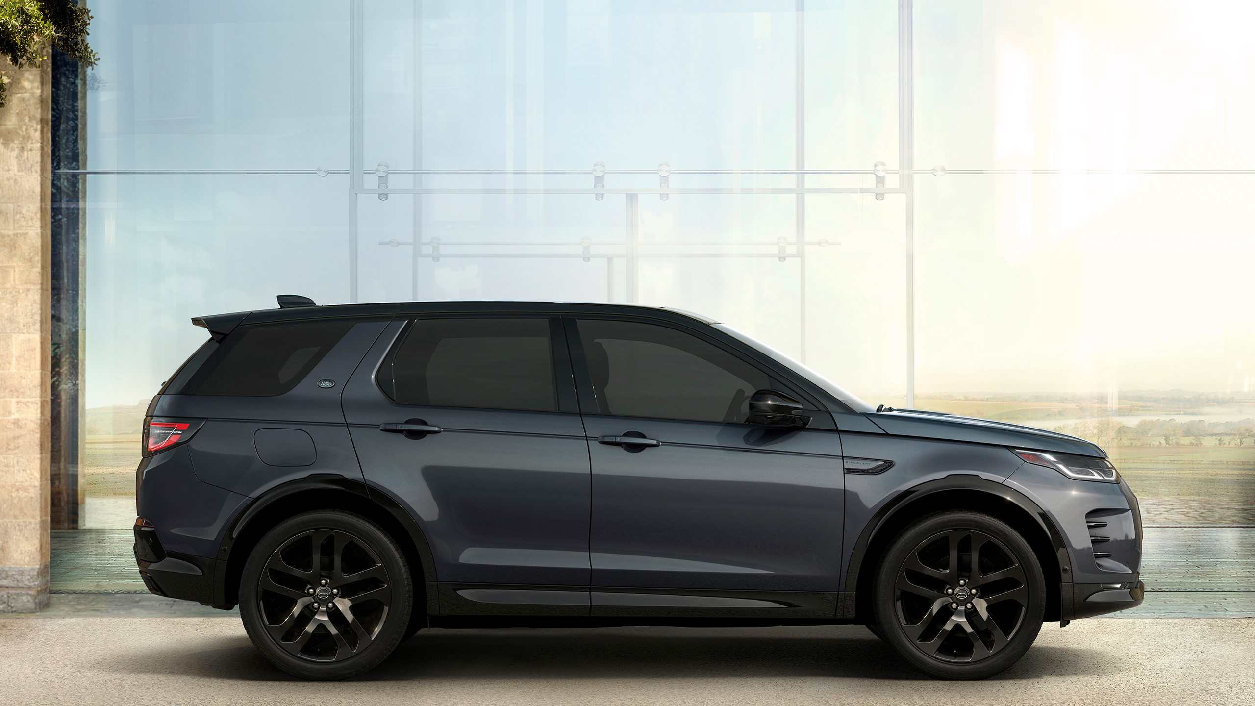 Discovery Sport parked outside on side view