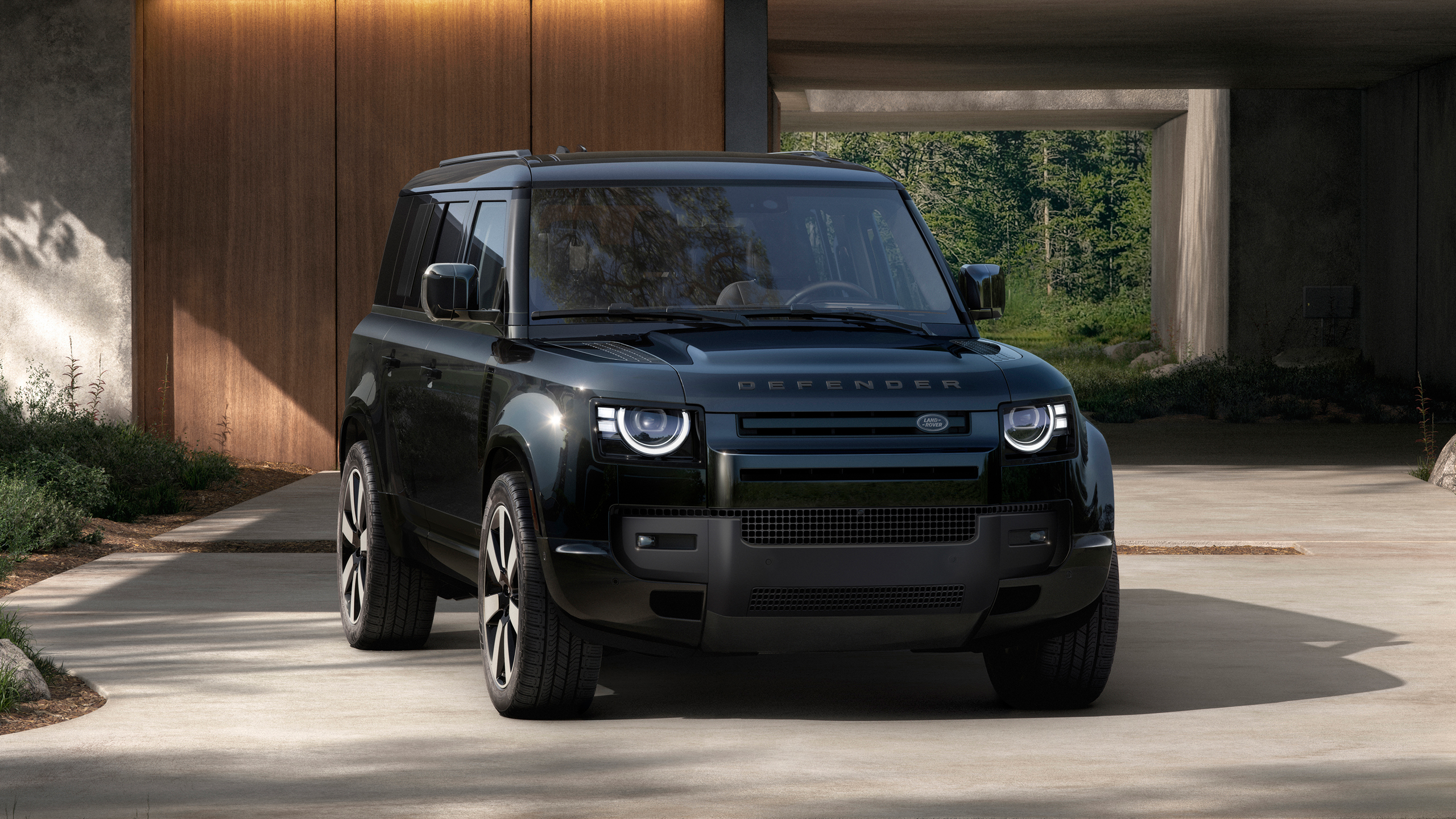 A Blue Defender parked. 