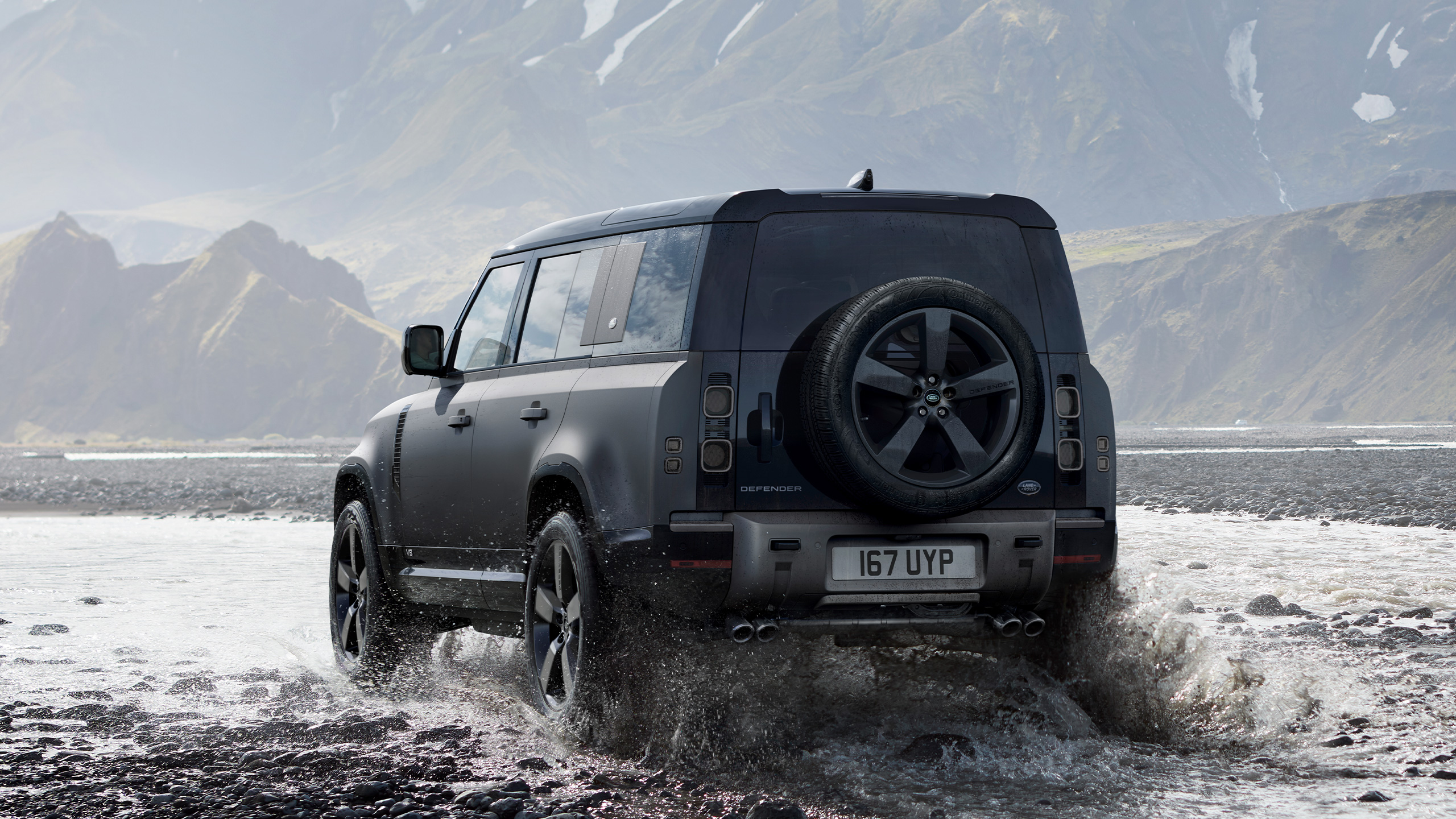 Range Rover 110 V8 crossing a river.